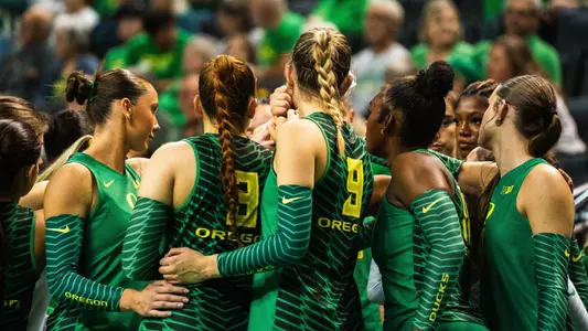 Team huddle vs Iowa (Oct. 3)