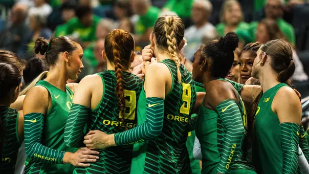 Team huddle vs Iowa (Oct. 3)