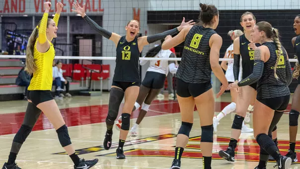 Team huddle, celebration at Maryland (Nov. 28)