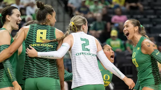 Team huddle celebration, Green-Yellow scrimmage (Aug. 8)