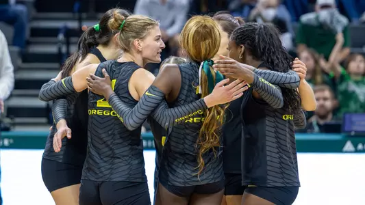 Team huddle at Michigan State (Oct. 9, 2026)