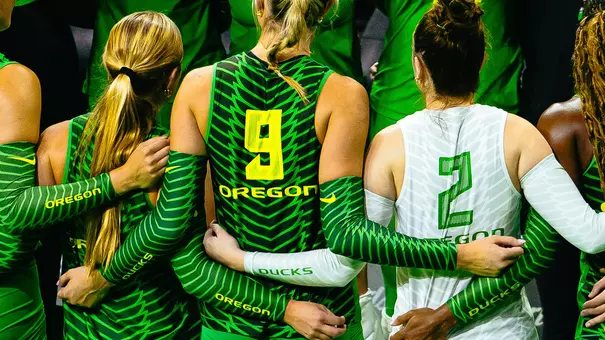 Team huddles vs Washington State (Sept. 6, 2026)
