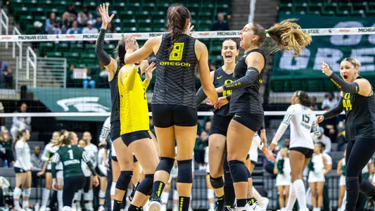 Team huddle, celebration vs Michigan State (Oct. 9, 2026)