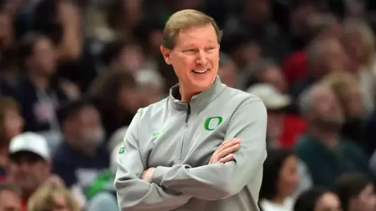 PORTLAND, OREGON - DECEMBER 21: Head coach Dana Altman of the Oregon Ducks smiles during the second half against the Gonzaga Bulldogs at Moda Center on December 21, 2025 in Portland, Oregon. (Photo by Soobum Im/Getty Images)