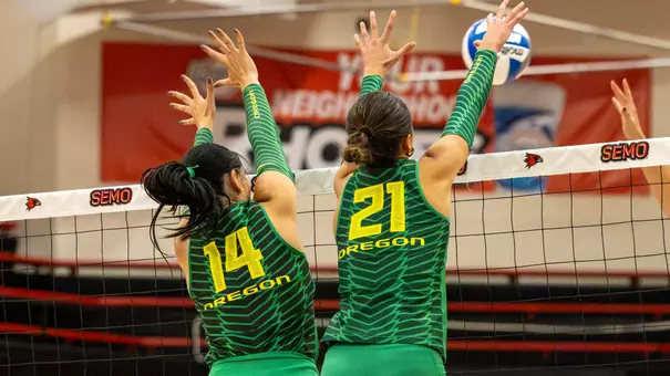 Gracia (21), Sucurovic (14) blocking vs Western Kentucky (Aug. 28, 2026)