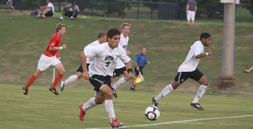 Spartans Up-ended by Camels in Conference Action Image