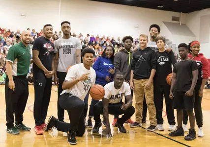 Upstate Men's Basketball Participates in Red Ribbon Week Image