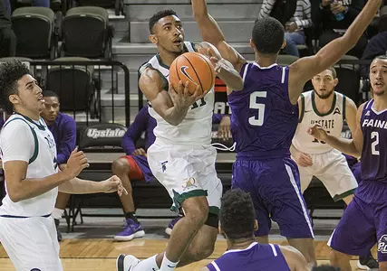 Holmes Finishes with Game-High 24 Points, Upstate Falls at Denver 84-69 Image