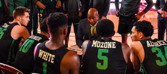Upstate Men's Basketball team huddle