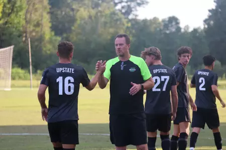 Head coach Scott Halkett before kick