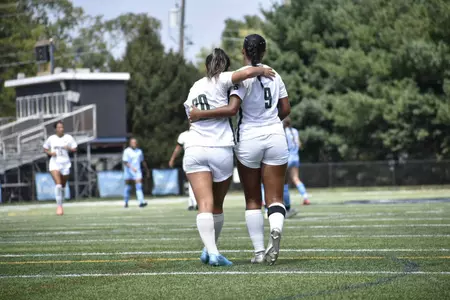 Nya Baccelli and Margret Edda Bjarnadottir Hugging After DSU
