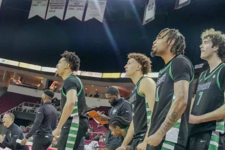 Men's Basketball bench hyped after an and-one vs. Fresno State