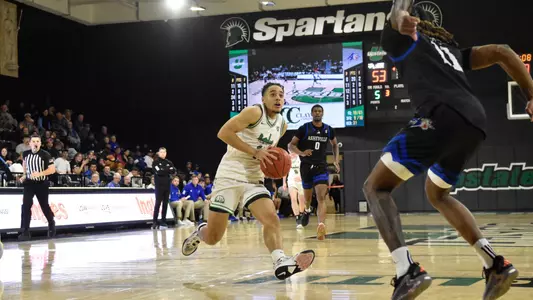 Karmani Gregory driving for a layup