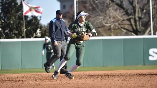 Alanna Deal throwing to First Base