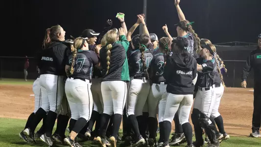 Upstate Softball celebrating after a team win at Furman