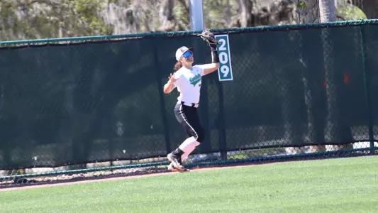 Denver Lauer catching a ball in the outfield