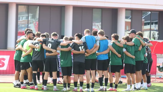 MSOC Huddle before the match at Liberty