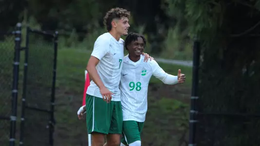 Vitalis Takawira Jr. and Oskar Kaufmann celebrating after a goal over Wofford