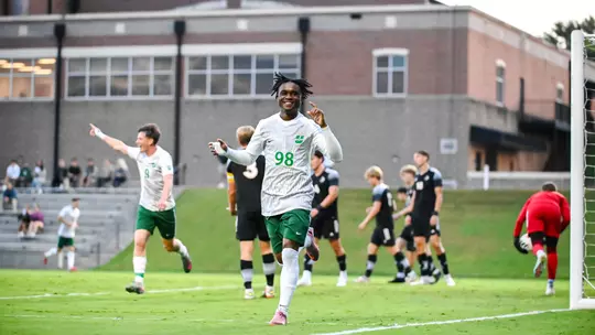 Vitalis Takawira Jr. celebrating after a goal against Wofford