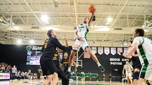 Learic Davis stretching out for the layup against Winthrop (1/10/25)
