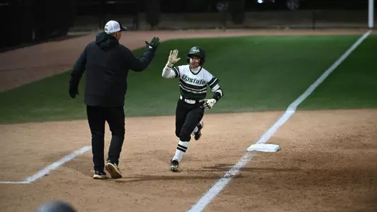 Taliyah Thomas after a solo shot HR
