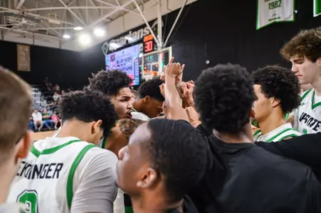 Breylin Garcia leading the huddle against PC