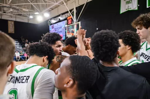 Breylin Garcia leading the huddle against PC