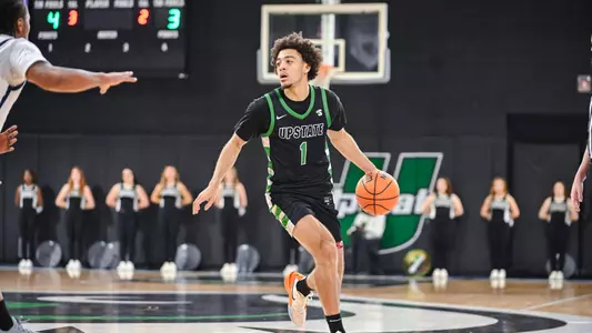 Karmani Gregory dribbling against Longwood
