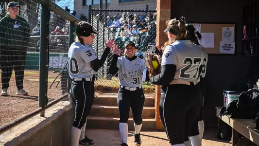 Taliyah Thomas going through the huddle