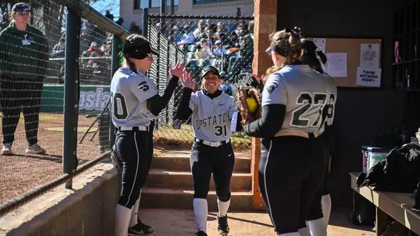 Taliyah Thomas going through the huddle