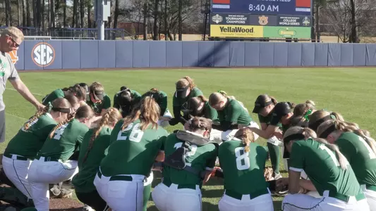 Softball prayer before Auburn Tournament