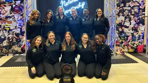 Dance Team at The College Classic National Championship with 4th place trophy