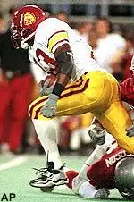 Sultan McCullough fights<br>for extra yards during<br>a second quarter run<br>in the Trojans 31-28<br>win over WSU.