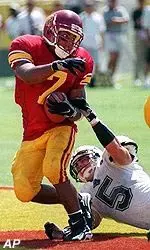 Tailback Chad Morton and<br>the Trojans open the 1999<br>season Sept. 4 at Hawaii.