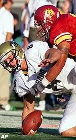 Senior linebacker Zeke Moreno's led USC with 103 tackles and named 2000's Most Valuable Player.