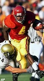 Sultan McCullough eludes a tackle by Colorado's Andy Peeke during the second quarter.