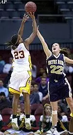 Guard Aisha Hollans put up 21 points for the Women of Troy in the season opener at Saint Joseph's.