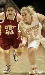 Tennessee's April McDivitt drives against USC's Ryane Alexander Sunday.