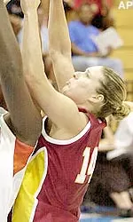 Carmen Krause goes up for a rebound during the Paradise Jam basketball tournament.