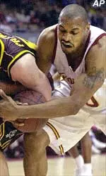 Arizona State center Chad Prewitt, left, and Southern California center Sam Clancy fight for the ball during the first half in Los Angeles Thursday.