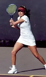 Anita Loyola (above) and Melissa Esmero posted the first win over UMBC to help the Trojans advance to the NCAA second round.