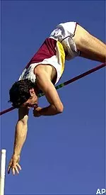 Trojan pole vaulter Dennis Kholev clears the bar at 18 -6 1/2 to win the pole vault at the NCAA Track and Field Championships in Eugene, Ore.