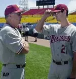USC pitcher Mark Prior chats with head coach Mike Gillespie during practice on Thursday.