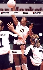 Freshman hitter Alicia Robinson posted an error-free performance to lead Trojans in 3-0 win over Bruins.