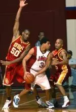 Sam Clancy and Brandon Granville, USC's top two leading scorers, lead the Trojans into Tucson on Thursday.