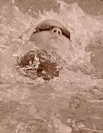 Sophomore Marisa Kozak swims the 200y back at the Cardinal and Gold meet on Friday (Oct. 18).