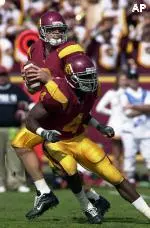 Palmer completed 288 of 458 passes for a USC record 3,639 yards and 32 touchdowns.