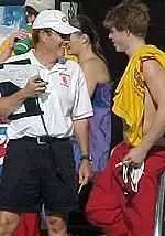 USC Coach Mark Schubert with senior Erik Vendt in the meet against the Arizona schools on Nov. 22.