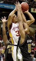 Desmon Farmer led the Trojans with 16 points, but it wasn't enough to beat the Tigers.