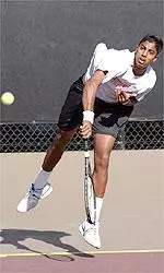 Freshman Prakash Amritraj upsets No. 1-ranked Harsh Mankad of Minnesota, 6-1, 7-6.